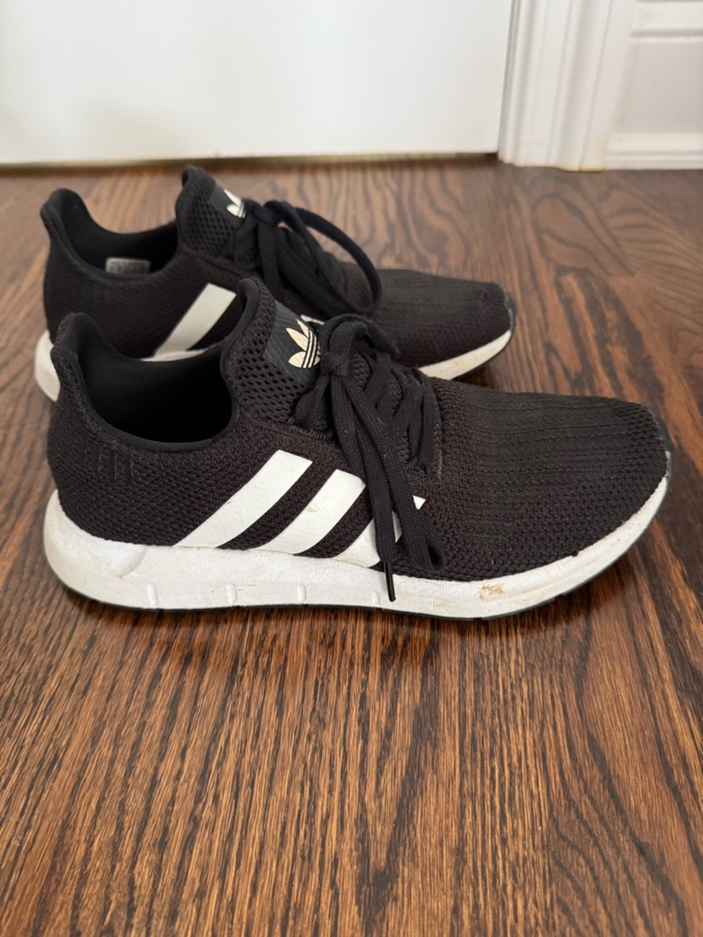 Women’s Adidas swift run black and white running sneakers size 8.5